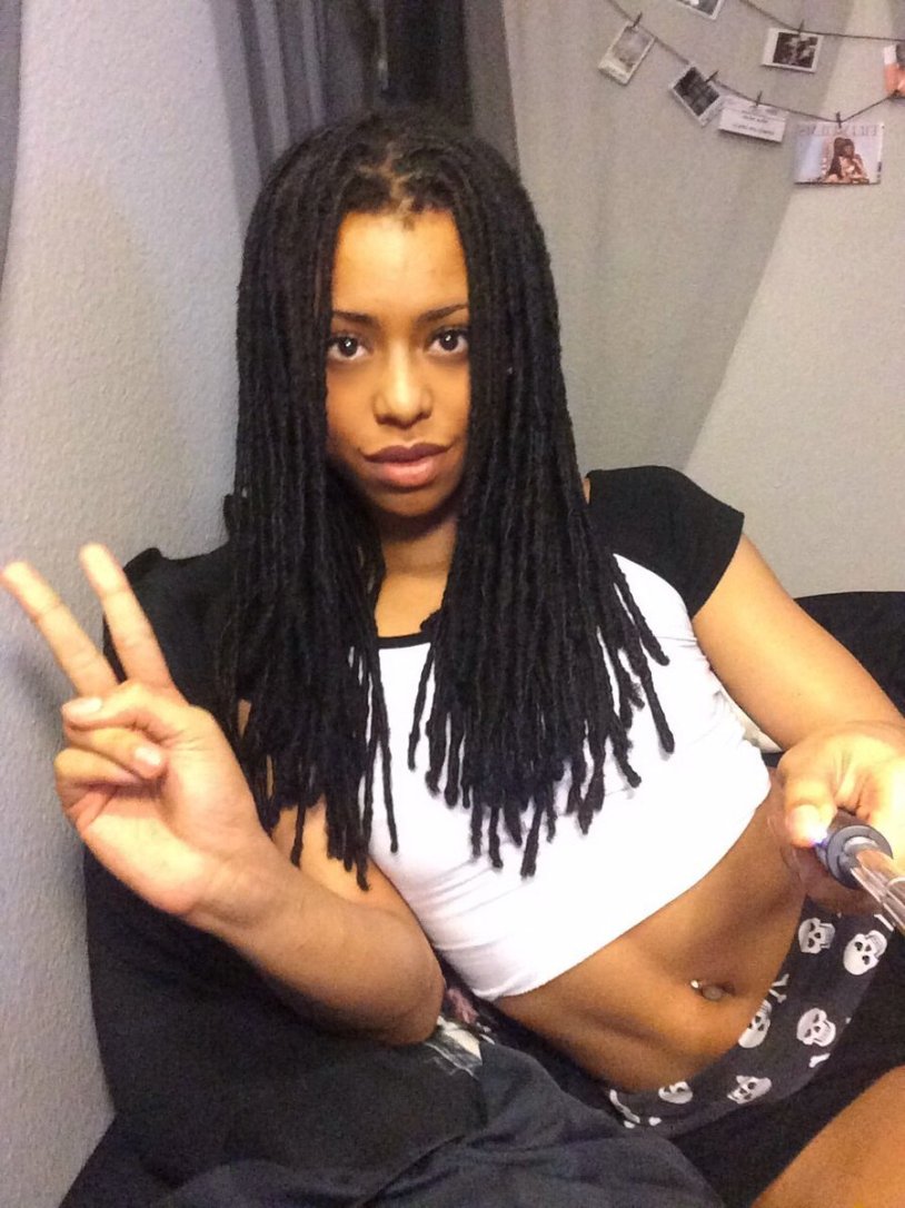 Kira Noir in red shorts