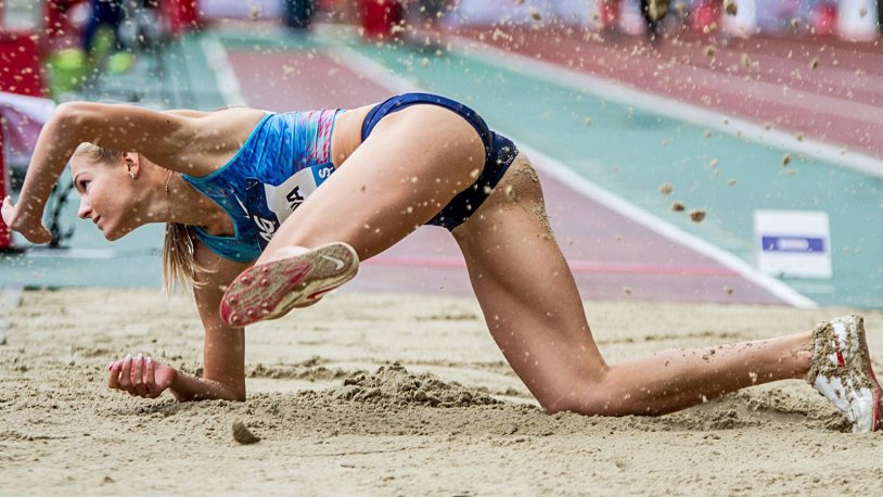 Daria Klina Light athletics on the beach