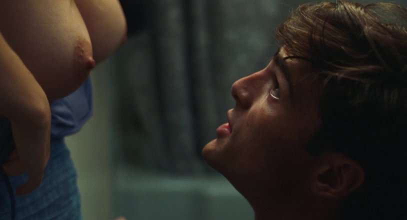 Woman Naked in a bar on the beach