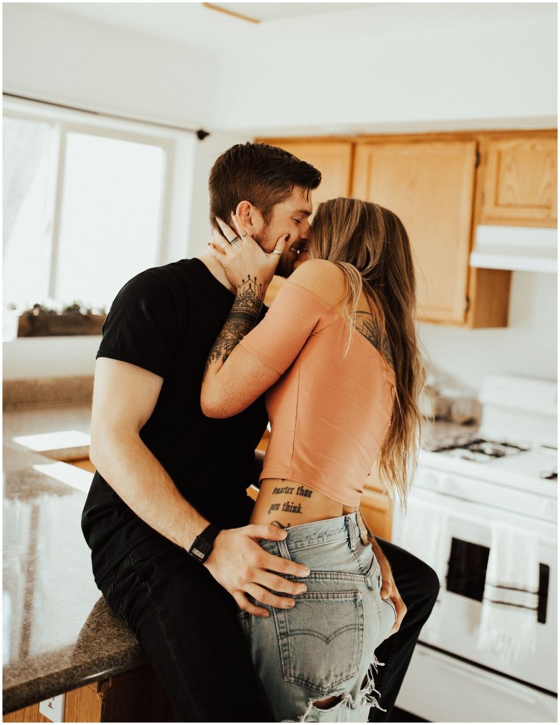 Husband and wife kiss