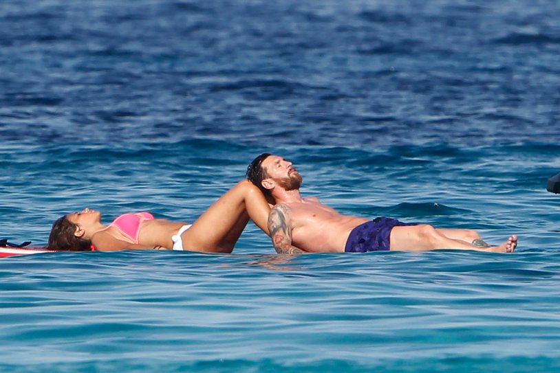 Krikino in a swimsuit and Messi