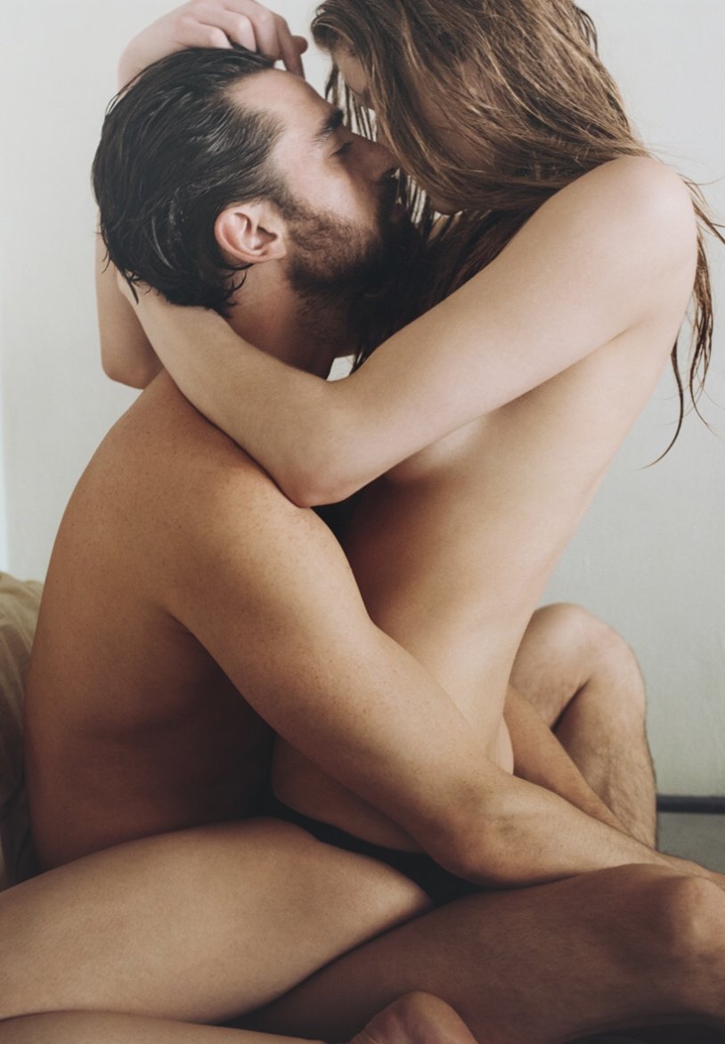 Romantic kiss in bed