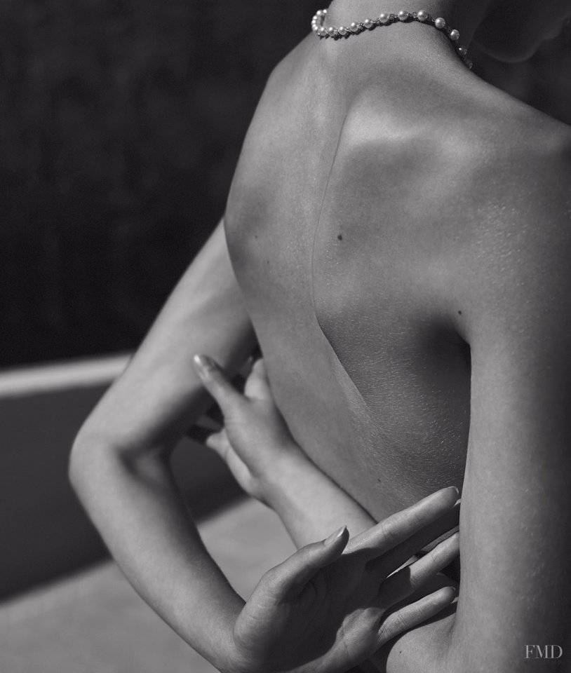 Girls in shorts on a bicycle