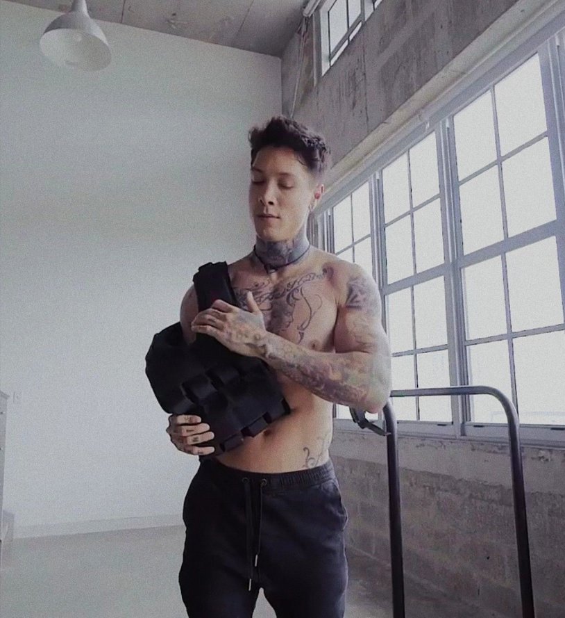 Chris Heria with his son