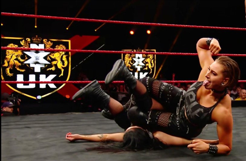 Rhea Ripley Belly Stab