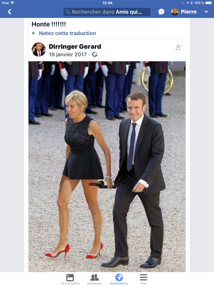 Brigitte Macron in a short black dress