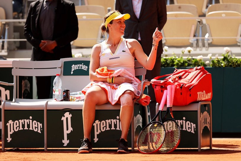 Maria Domark in a white swimsuit