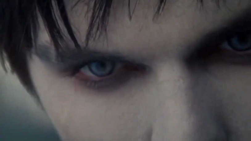 A man in bed with another