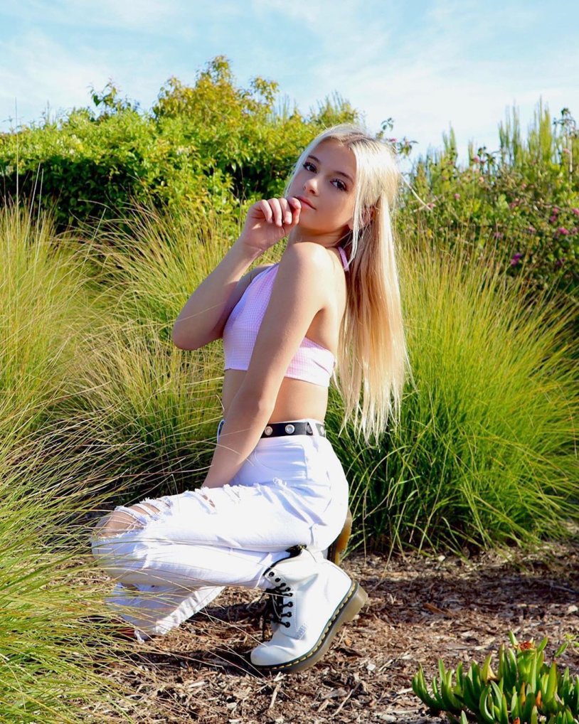 Coco singer in a swimsuit