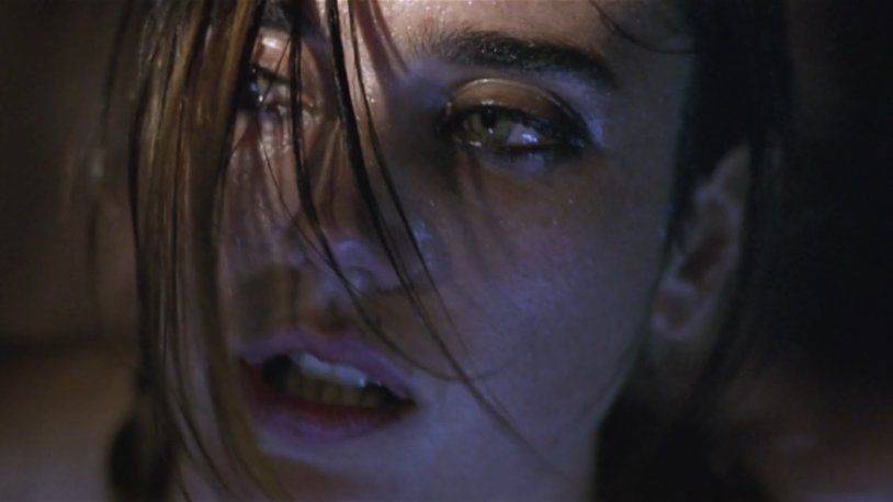 Jennifer Connelli in the bathroom