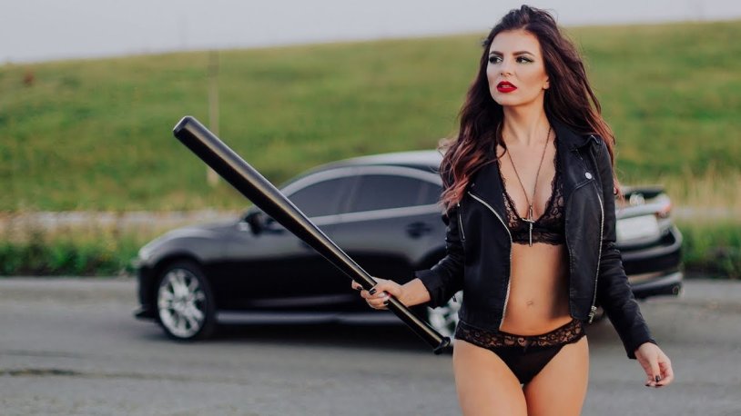 Beautiful girl with a bat