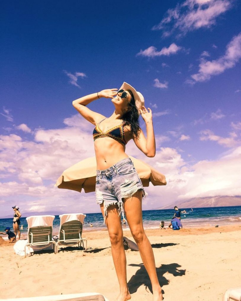 In swimsuits on the beach