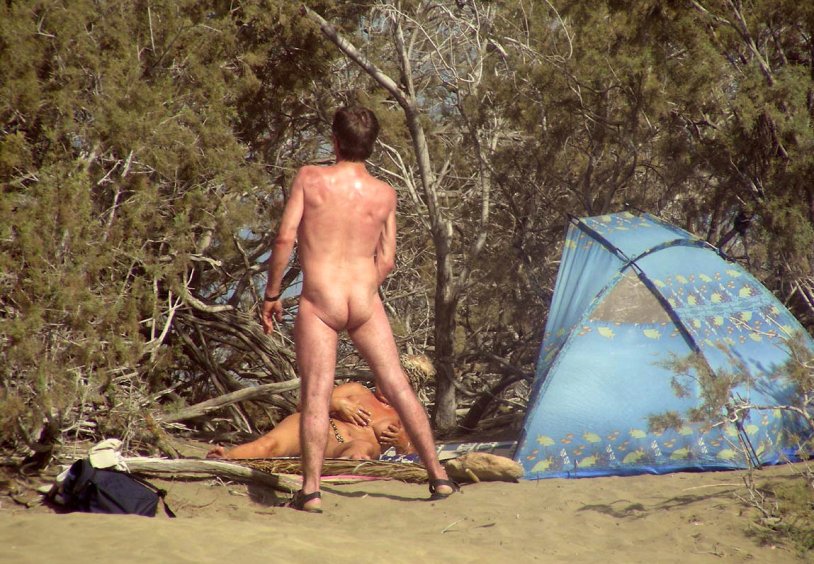 Swingers on a wild beach