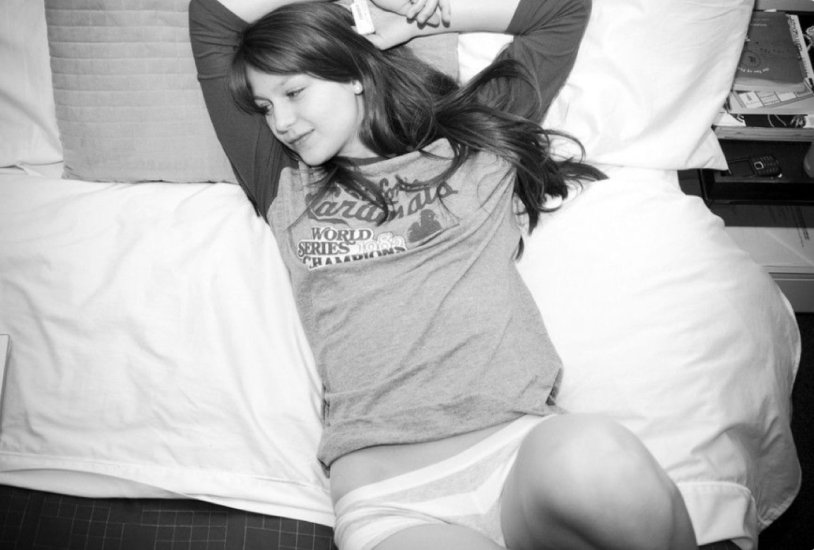 Melissa Benoist on the bed