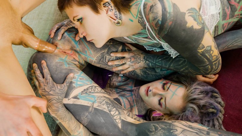 Fisting with a tattooed hand