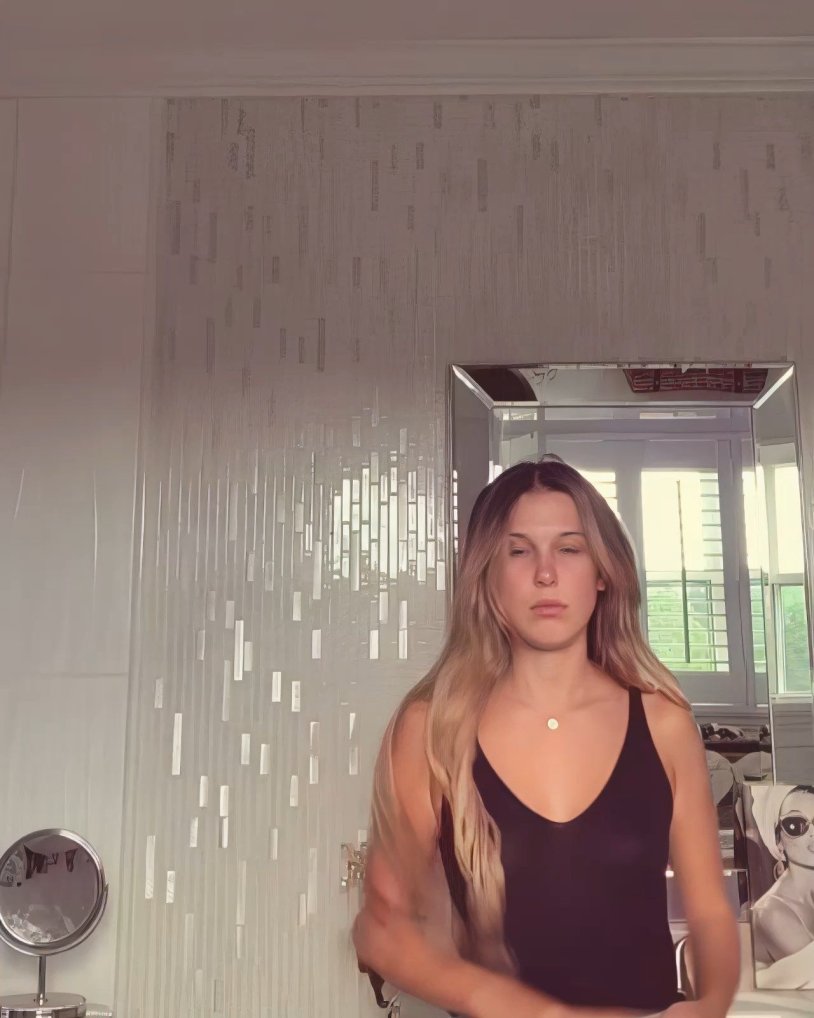 Millie Bobby Brown Paparazzi on the beach