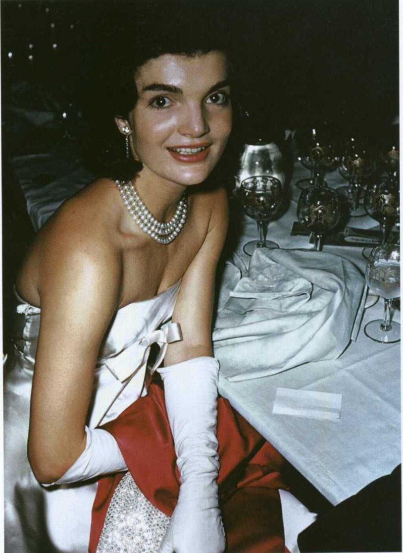 Photo by Kennedy with his wife on the grass