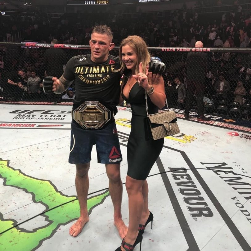 Dustin Poirier with his wife