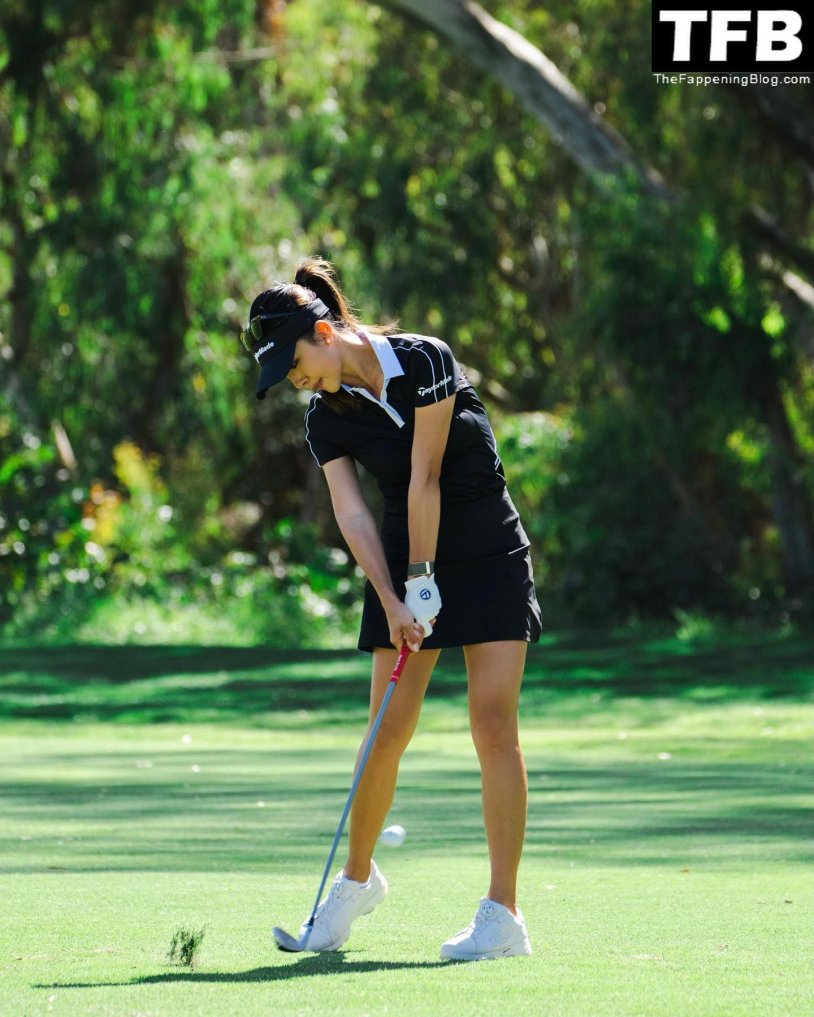 Girls on a bicycle in a swimsuit