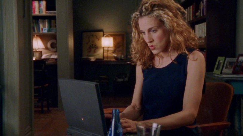 Kerry Bredshaw behind a laptop