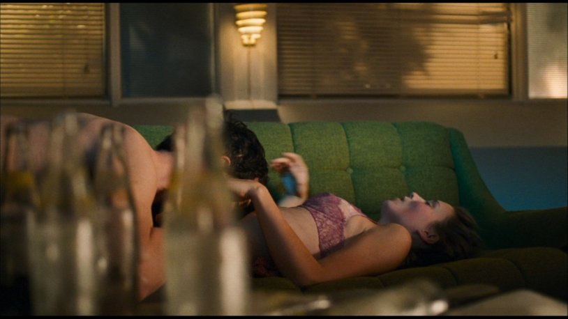 Naked Numi Rapas with a dragon tattoo