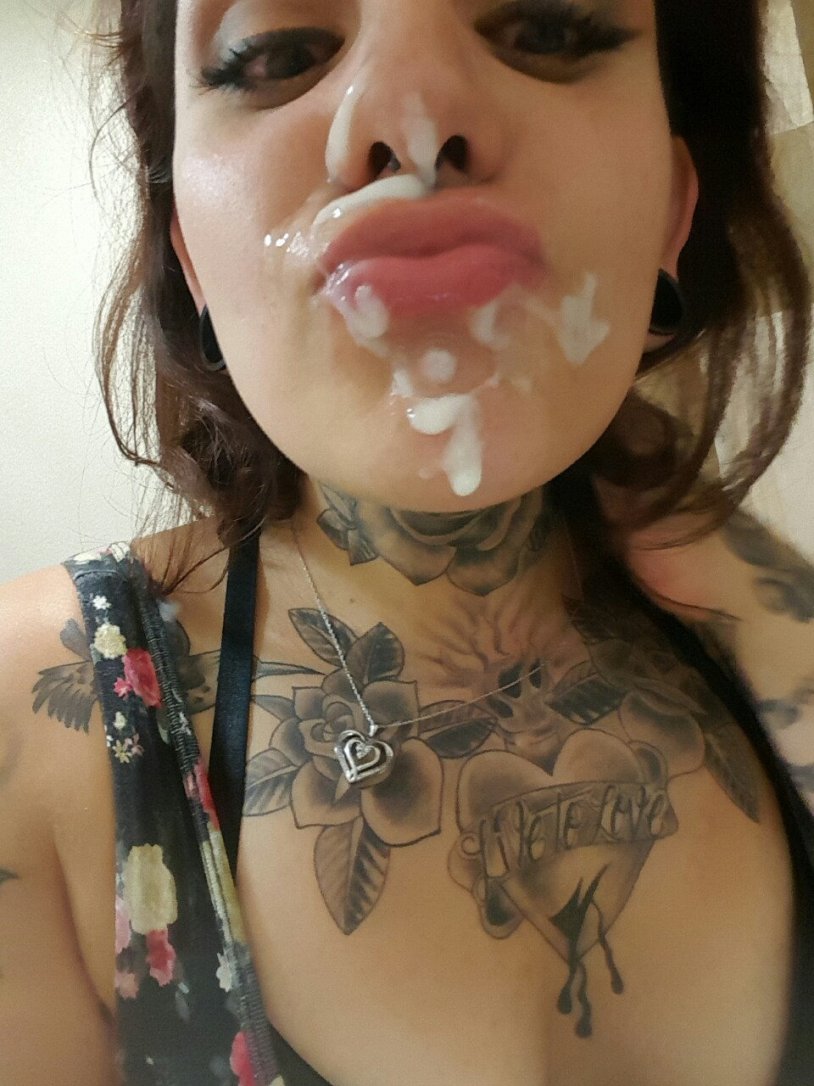 Tattooed Genevieve Sinn has fun in the shower