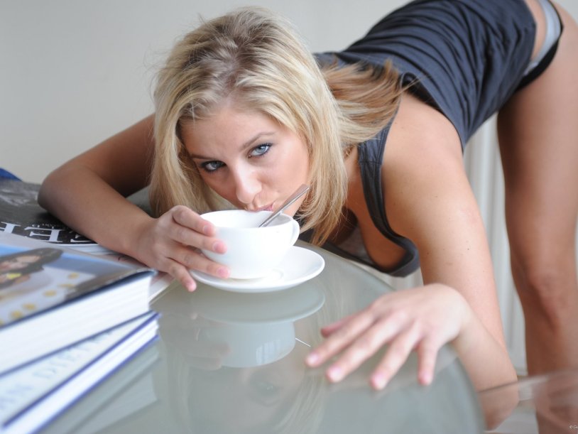 Beautiful naked women in the kitchen