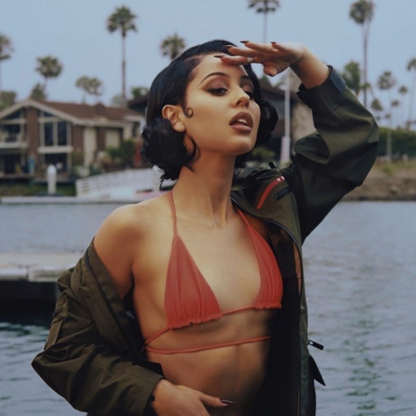 Alex Demi in the video