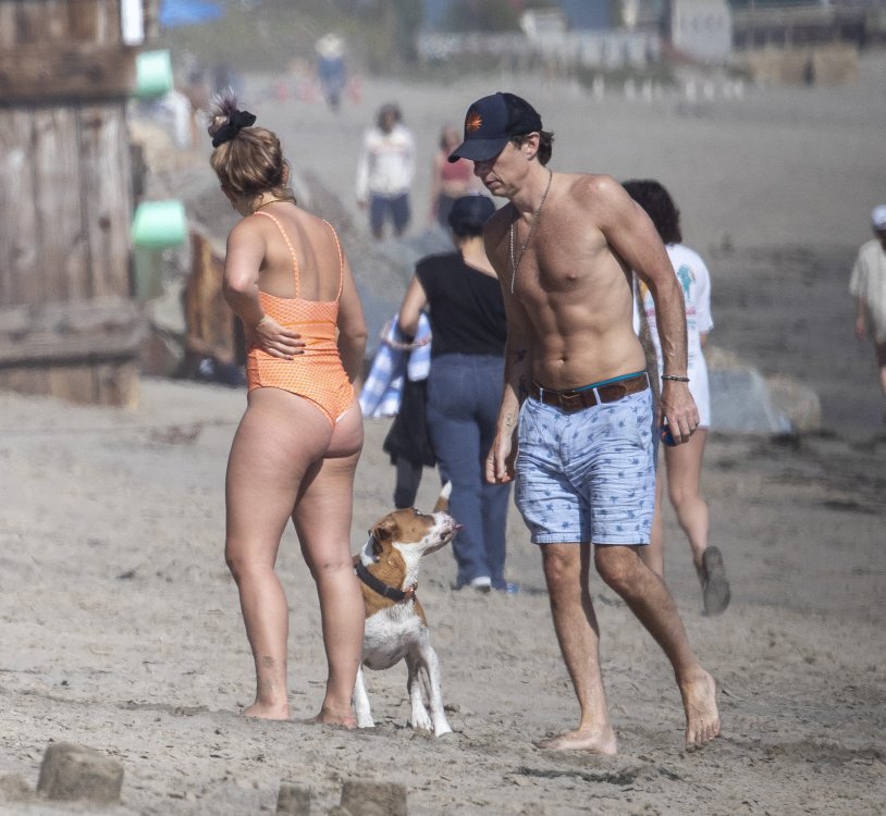 Florence I drink in a swimsuit