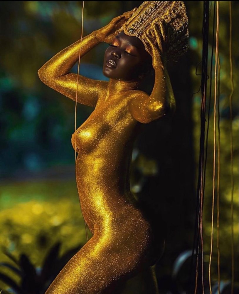 Girl in gold paint