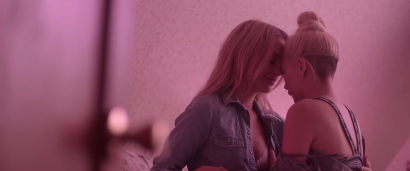 The girl takes off the bra