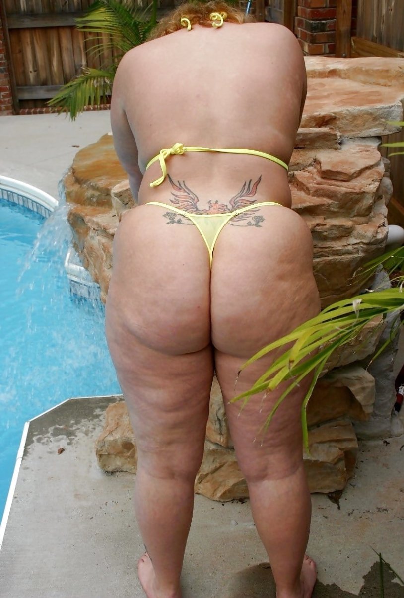 Fat women in thongs on the beach