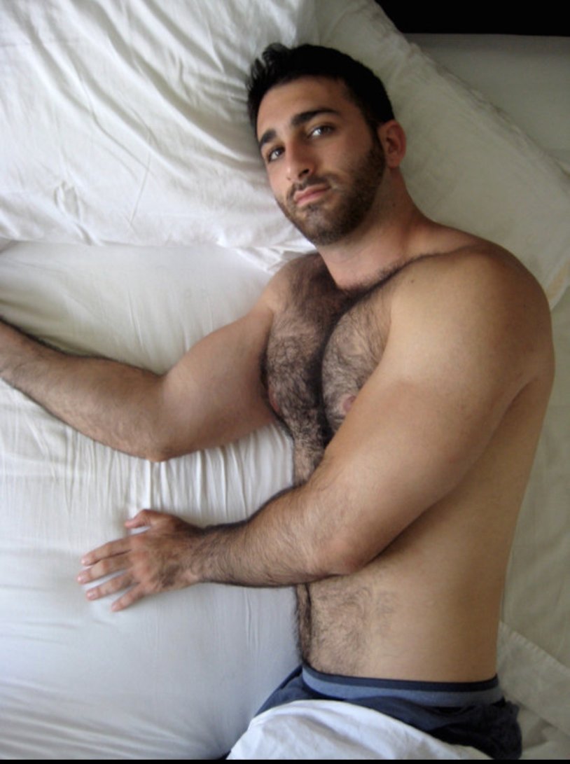 Naked men fuck on the beach