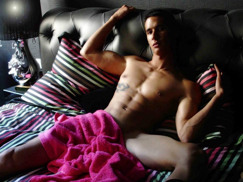 Girl with a man in bed