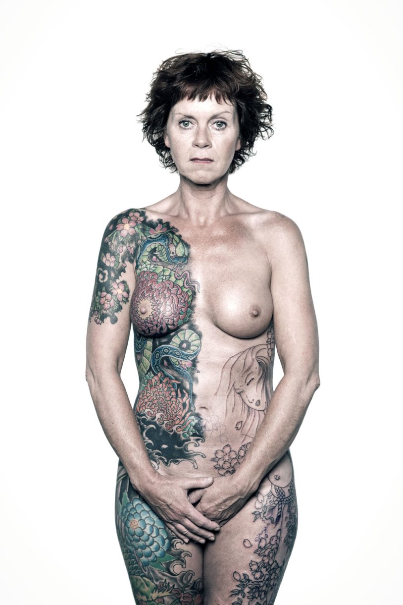 Naked mature in tattoos