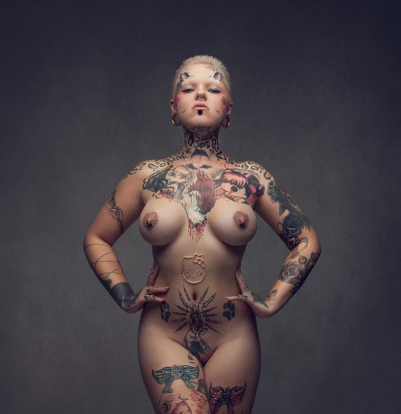 Naked women with piercing in the navel