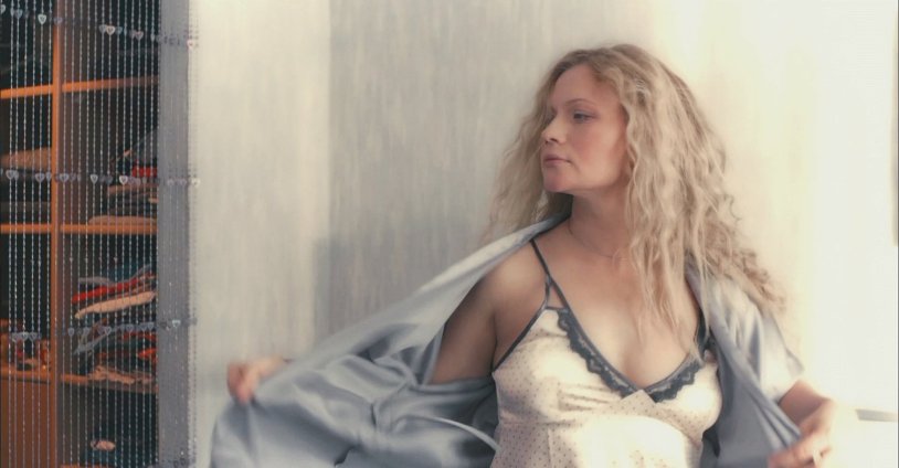 Naked Nicole Kidman in a film with wide eyes