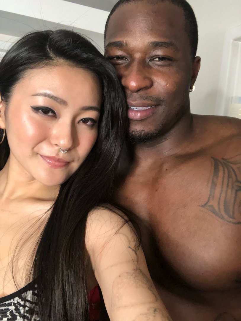 Asian with a black man