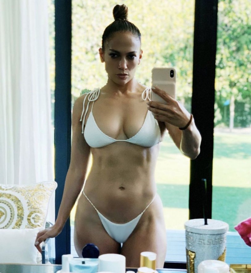 Jennifer Lopez in a white swimsuit