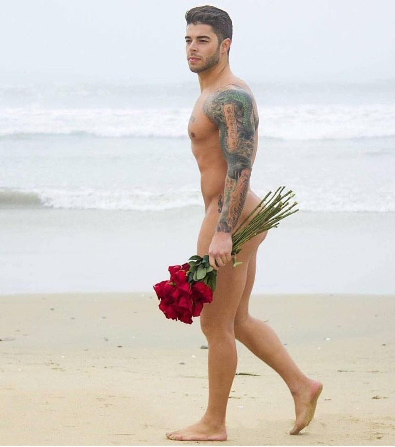 Naked man with flowers