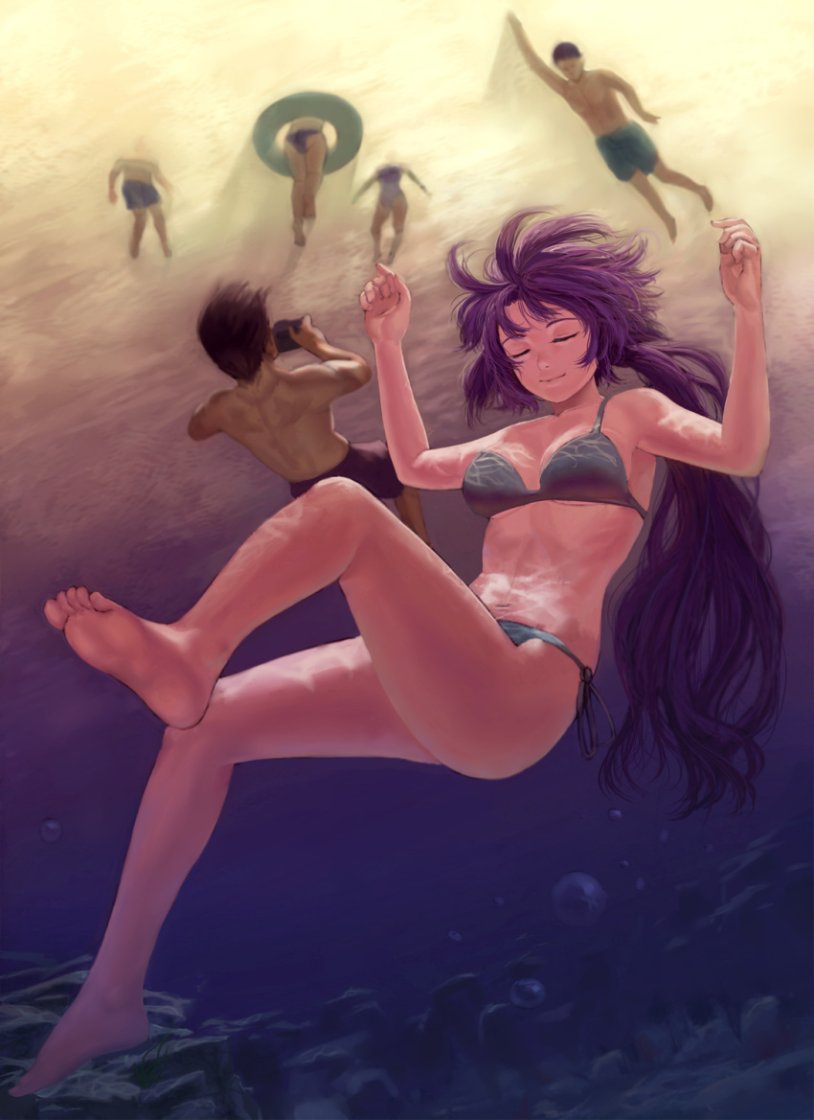 Girls in a bikini underwater