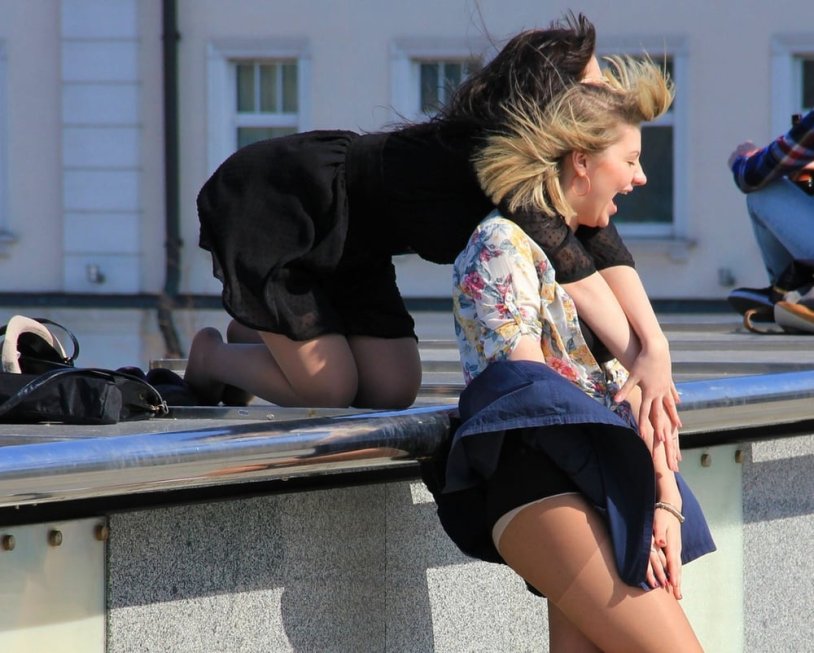 Girls and wind on the street