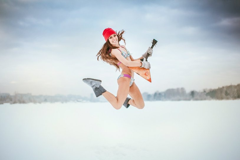 Girl in a swimsuit in winter