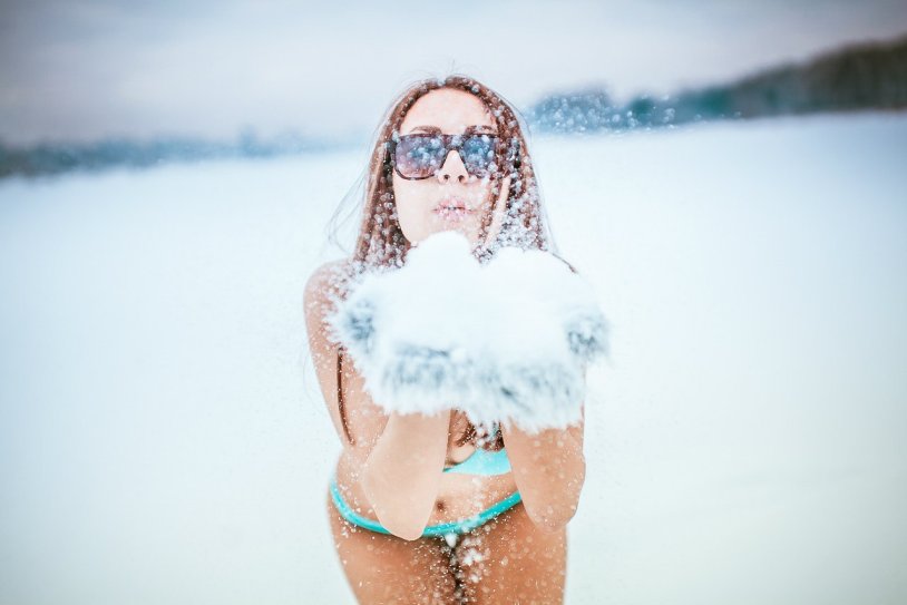 Girl in a swimsuit in winter