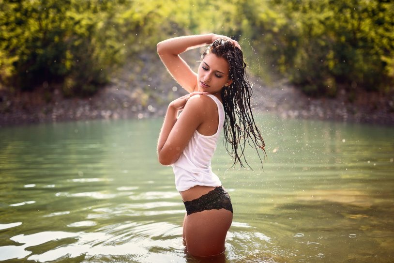 Beautiful girls in wet clothes