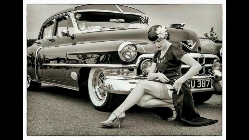 Girl repairing retro car