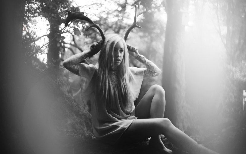 Girl blonde with horns