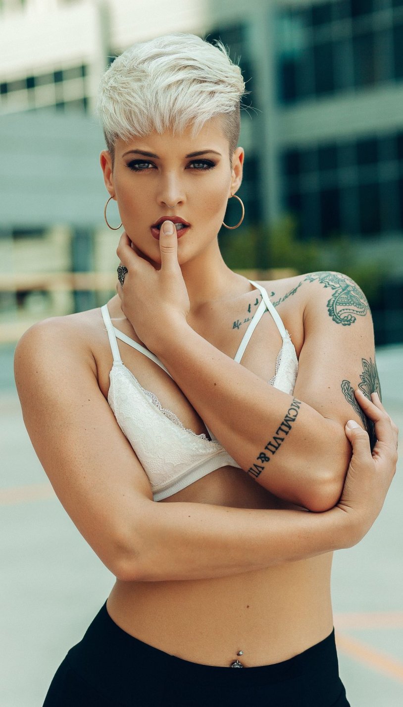 Bold short female haircut