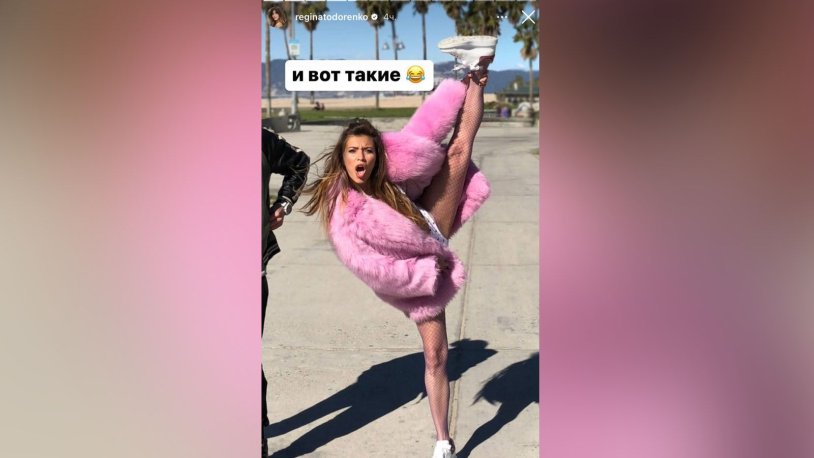 Regina Todorenko in pink coat