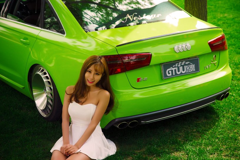 Green car with a girl